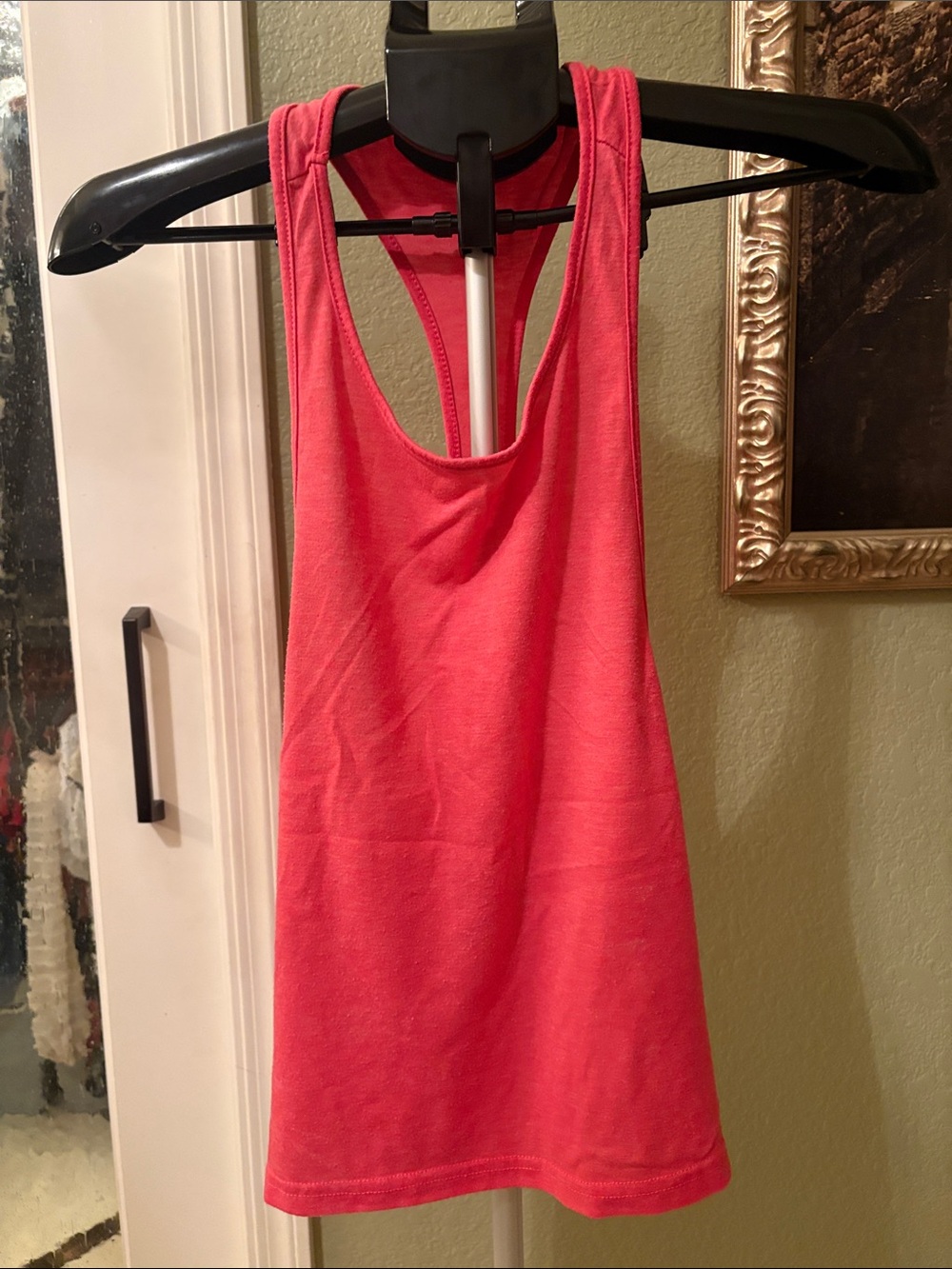 Salmon colored t-back tank top